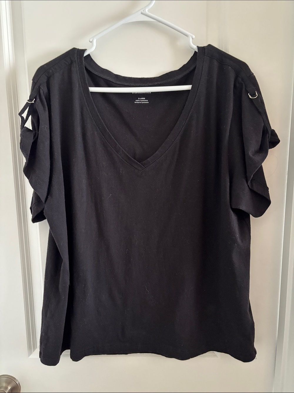 Anthropologie Black V‑Neck Short Sleeve Top with Ring Detail